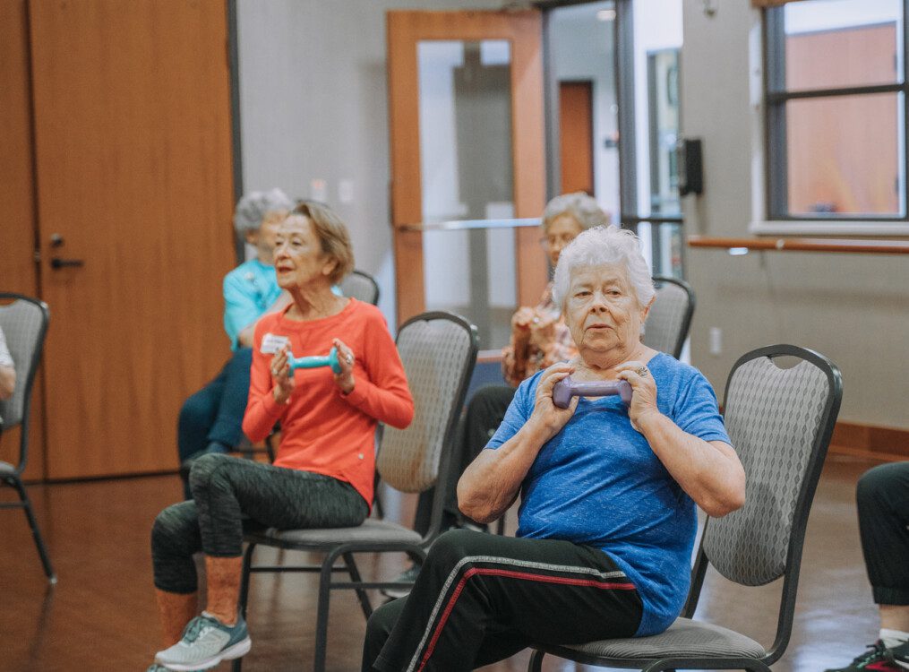 women doing chair yoga