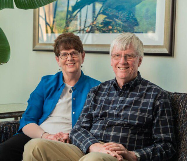 couple sitting on sofa